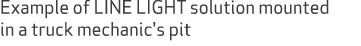 Example of LINE LIGHT solution mounted in a truck mechanic's pit
